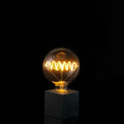 Segula LED Bridge Globe 125 Curved Plus klar E27, 6,5 W, 1900 K, dimmbar